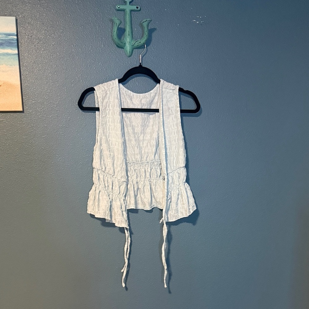 White Sleeveless Ruffled Vest